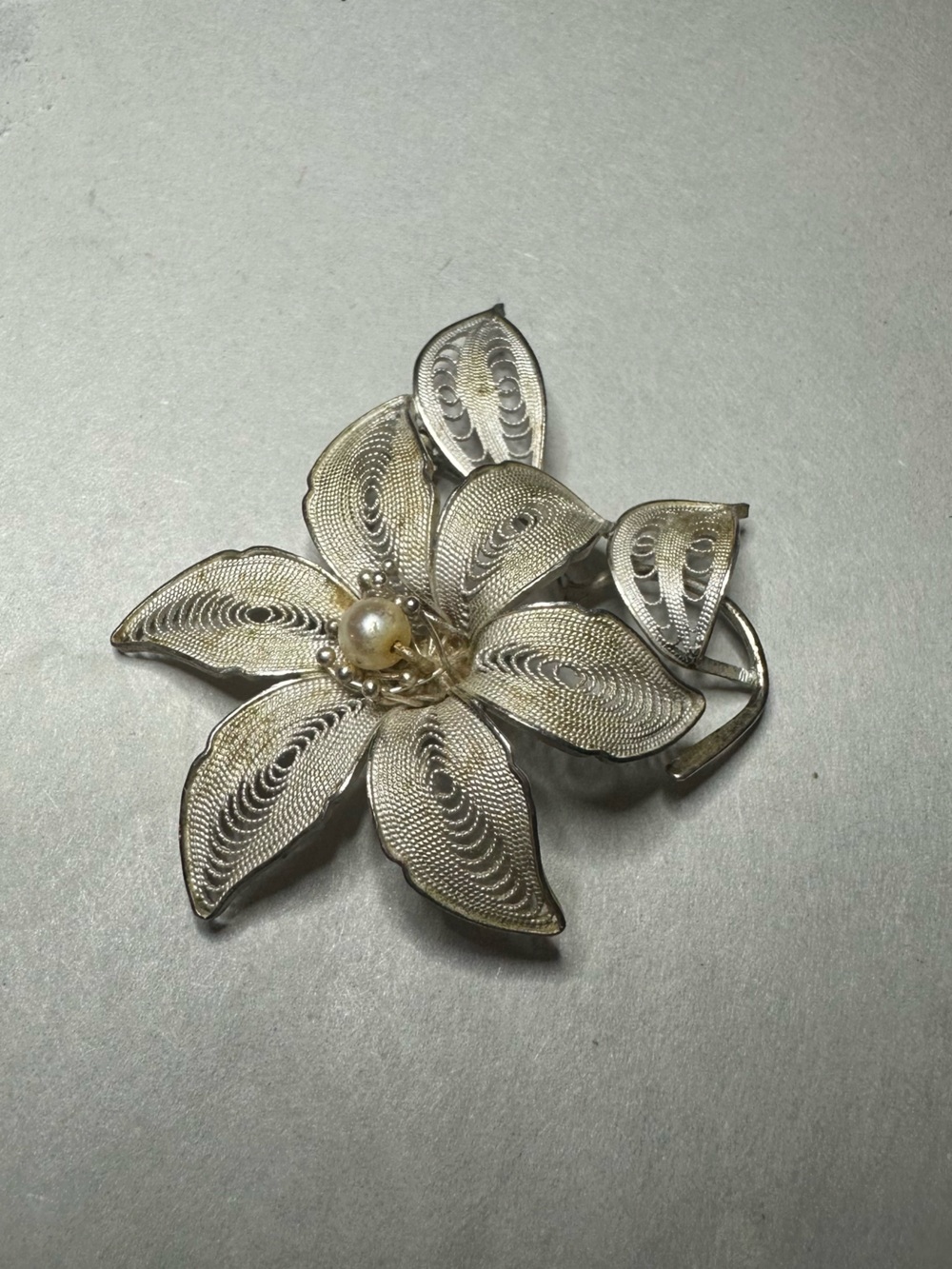 Silver Tone Filigree Floral Brooch with Pearl Accent